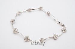 10k White Gold Diamond Heart Tennis Bracelet 7