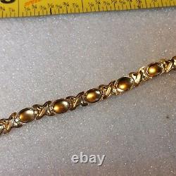 10k Yellowithwhite Gold XO Link Bracelet 7
