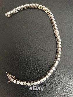 14 K White Gold and Diamond Tennis Bracelet (appraised at $6,500)