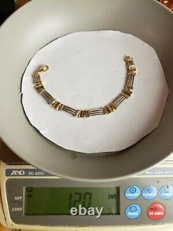 14 Kt Yellow And White Gold Cable Bracelet 7