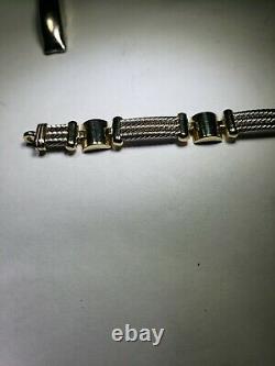 14 Kt Yellow And White Gold Cable Bracelet 7