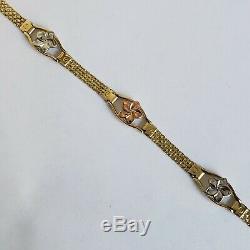 14k yellow gold flower bracelet 7.25 Inches Long woman's white rose