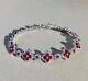 18Ct Round Cut Lab-Created Red Ruby Bracelet Size 7.5 14K White Gold Plated
