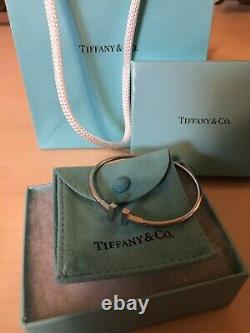 $1930 Retailed 18K WG Tiffany & Co. T Wire Bracelet/box/pouch Included