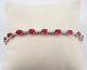 5Ct Oval Cut Lab-Created Red Ruby Unique Tennis Bracelet 14K White Gold Plated
