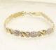 7.25 Diamond Cut Hugs and Kisses Stampato Bracelet Real 10K Yellow White Gold