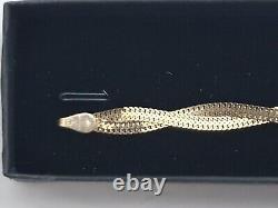 9 ct Yellow gold twisted strands bracelet Mint Condition very good condition