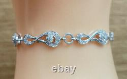 9ct White Gold Diamond Bracelet, 12.4cm length, 0.7cm wide