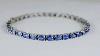 Different Shades Of Blue Sapphire Bracelet In 18k White Gold