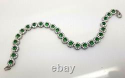 White gold finish Green emerald and created diamonds tennis bracelet round cut