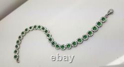 White gold finish Green emerald and created diamonds tennis bracelet round cut