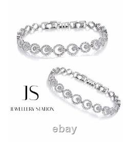 White gold finish circle design created diamond bracelet