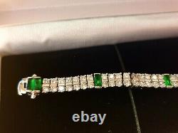 White gold finish created diamond and emerald triple row tennis bracelet giftbox