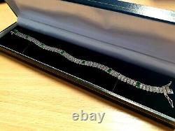 White gold finish created diamond and emerald triple row tennis bracelet giftbox